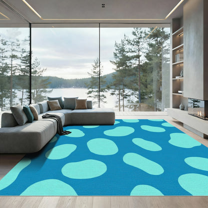 Teal Irregular Shapes on Blue Rug