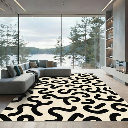 Bold Black Swirls Cream Background Rug