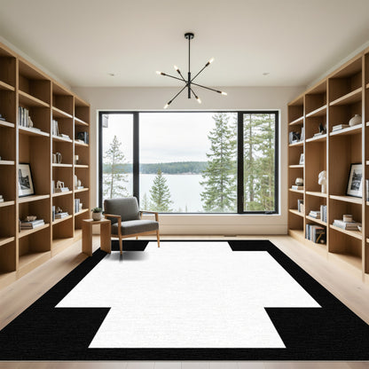 Bold Black and White Geometric Cross Rug