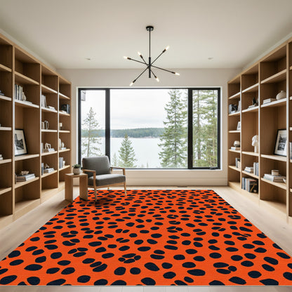 Orange And Black Spotted Area Rug