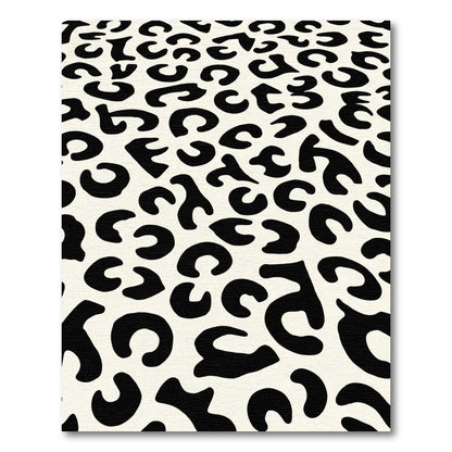 Classic Black Cream Animal Spot Rug