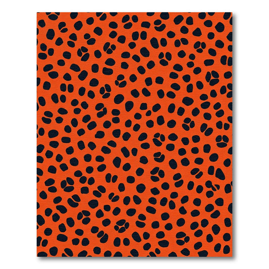 Orange And Black Spotted Area Rug